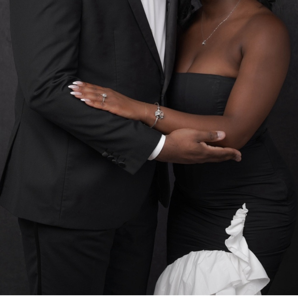 Elegant Strapless Black Dress with White Sculpted Accent